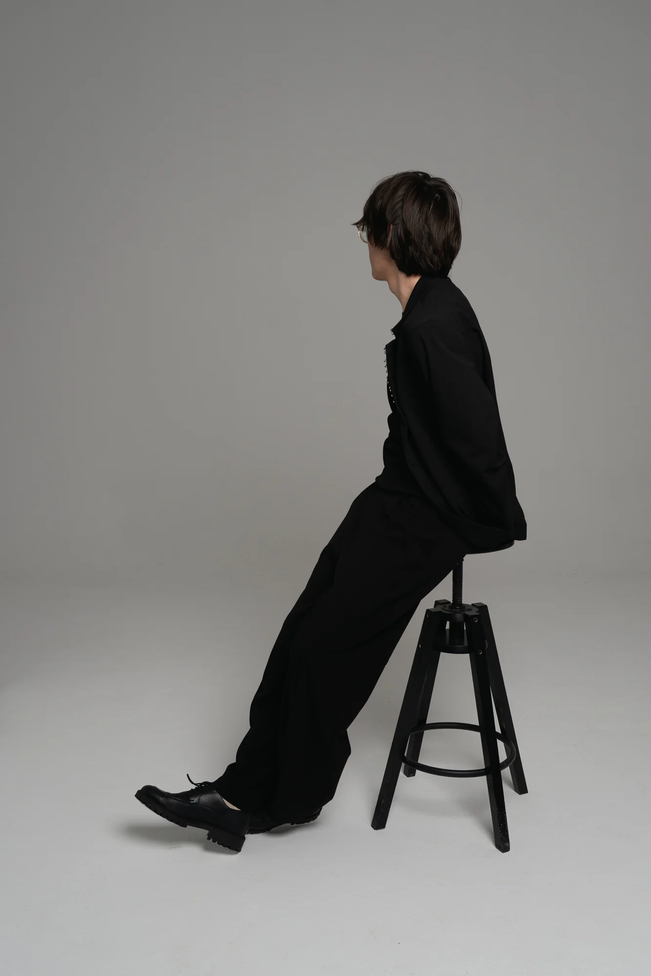 photo of me from the photosession. I'm sitting on a chair against the background of a white cyclorama